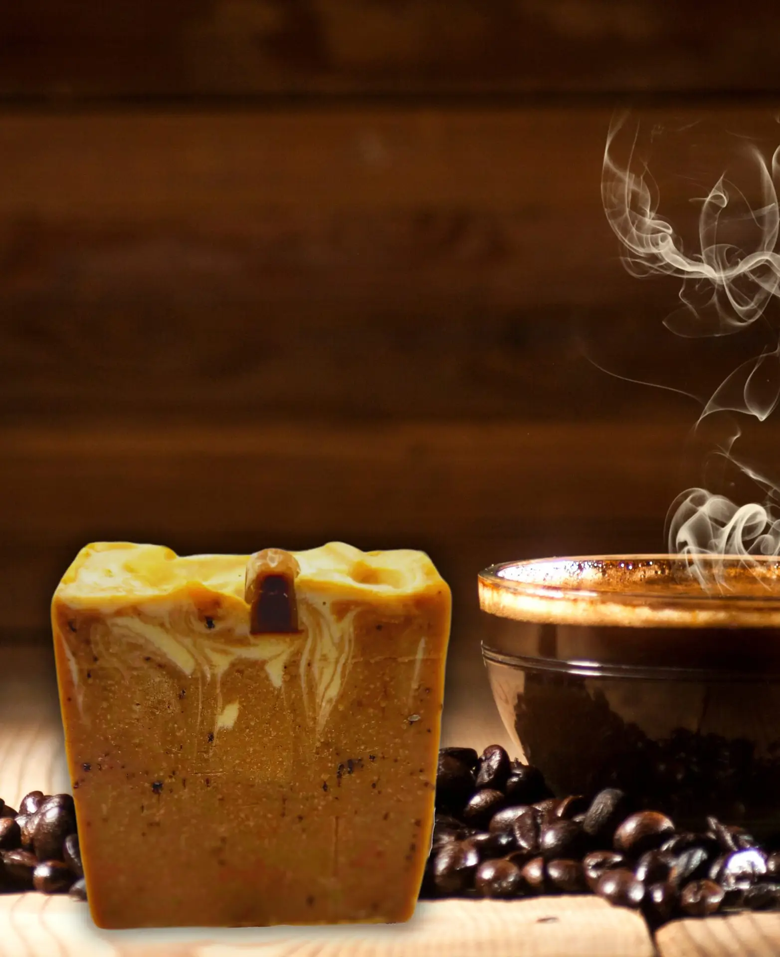 Savon exfoliant Barista Scrub avec des grains de café, accompagné d'une tasse de café fumant, symbolisant l'éveil des sens et le soin de la peau.